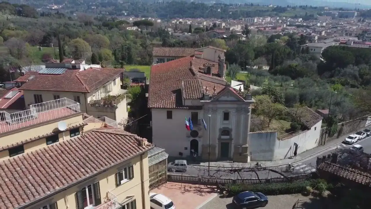 Aerial view of the Piarist Fathers campus on Via Bolognese, with Florence in the background